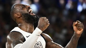 USA's #06 LeBron James celebrates at the end of the men's semifinal basketball match between USA and Serbia during the Paris 2024 Olympic Games at the Bercy Arena in Paris on August 8, 2024. (Photo by Aris MESSINIS / AFP)