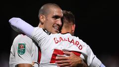 CAMBRIDGE, ENGLAND - AUGUST 23: Dominic Ballard of Southampton is congratulated by teammate Oriol Romeu after scoring their side's third goal during the Carabao Cup Second Round match between Cambridge United and Southampton at Abbey Stadium on August 23, 2022 in Cambridge, England. (Photo by Alex Burstow/Getty Images)