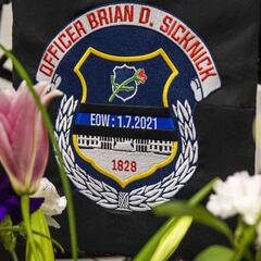 What did Pelosi say about the police officer killed in the Capitol riots?