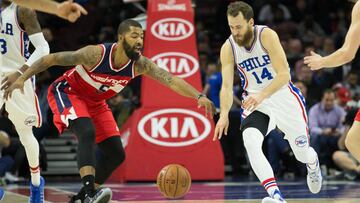 Nov 16, 2016; Philadelphia, PA, USA; Philadelphia 76ers guard Sergio Rodriguez (14) dribbles past Washington Wizards forward Markieff Morris (5) during the second quarter at Wells Fargo Center. Mandatory Credit: Bill Streicher-USA TODAY Sports
