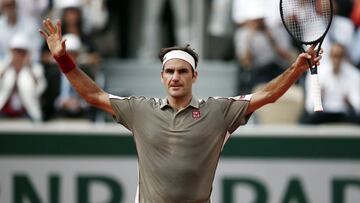 Roger Federer celebra su triunfo ante Wawrinka.