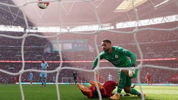 Manchester City goalkeeper Zack Steffen looks on as an error leads to Liverpool's Sadio Mane (left) scoring their side's second goal during the Emirates FA Cup semi final match at Wembley Stadium, London. Picture date: Saturday April 16, 2022. (Photo by Nick Potts/PA Images via Getty Images)