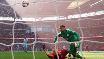 Manchester City goalkeeper Zack Steffen looks on as an error leads to Liverpool's Sadio Mane (left) scoring their side's second goal during the Emirates FA Cup semi final match at Wembley Stadium, London. Picture date: Saturday April 16, 2022. (Photo by Nick Potts/PA Images via Getty Images)