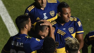Edwin Cardona of Boca Juniors, center, celebrates after scoring against Banfield, with teammates during Argentina's soccer league Copa Diego Maradona final championship match, in San Juan, Argentina, Sunday, Jan. 17, 2021. (Andres Larrovere/Pool via