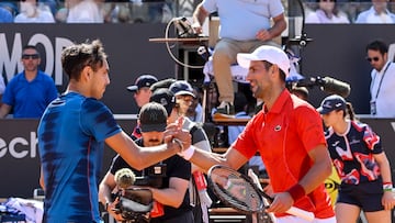 Rome (Italy), 12/05/2024.- Alejandro Tabilo of Chile (L) shakes hands with Novak Djokovic of Serbia after winning their men's singles match at the Italian Open tennis tournament in Rome, Italy, 12 May 2024. (Tenis, Italia, Roma) EFE/EPA/ALESSANDRO DI MEO