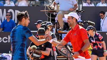 Rome (Italy), 12/05/2024.- Alejandro Tabilo of Chile (L) shakes hands with Novak Djokovic