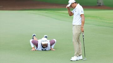 ATLANTA, GEORGIA - AUGUST 24: Collin Morikawa of the United States and caddie J.J. Jakovac line up a putt on the 16th green during the first round of the TOUR Championship at East Lake Golf Club on August 24, 2023 in Atlanta, Georgia.   Kevin C. Cox/Getty Images/AFP (Photo by Kevin C. Cox / GETTY IMAGES NORTH AMERICA / Getty Images via AFP)