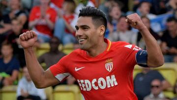 Soccer Football - Ligue 1 - AS Monaco vs RC Strasbourg - Stade Louis II, Monaco - September 16, 2017 Monaco's Radamel Falcao celebrates scoring their third goal REUTERS/Jean-Pierre Amet