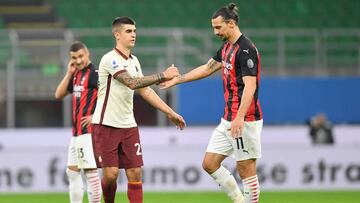 Soccer Football - Serie A - AC Milan v AS Roma - San Siro, Milan, Italy - October 26, 2020 AC Milan&acirc;s Zlatan Ibrahimovic shakes hands with AS Roma&acirc;s Gianluca Mancini after the match REUTERS/Daniele Mascolo