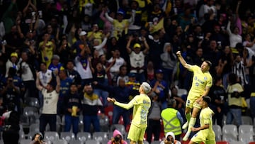 Diego Valdes of America (L) celebrates after scoring a goal against Monterrey during their Mexican Clausura 2023 tournament football match at the Azteca stadium in Mexico City on April 8, 2023. (Photo by CLAUDIO CRUZ / AFP)