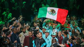 LAS VEGAS, NEVADA - MAY 04: Canelo Alvarez (C) makes his ring walk for his undisputed super middleweight championship fight against Jaime Munguia at T-Mobile Arena on May 04, 2024 in Las Vegas, Nevada. Alvarez retained his titles in a unanimous decision.   Ethan Miller/Getty Images/AFP (Photo by Ethan Miller / GETTY IMAGES NORTH AMERICA / Getty Images via AFP)