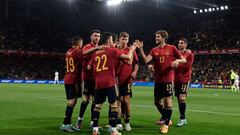 Spain&#039;s forward Pablo Sarabia (C) celebrates with teammates after scoring a goal during the friendly football match between Spain and Iceland at the Municipal de Riazor stadium in La Coruna on March 29, 2022. (Photo by JAVIER SORIANO / AFP)