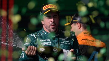 Third place Aston Martin's Spanish driver Fernando Alonso celebrates on the podium after the Formula One Brazil Grand Prix at the Autodromo Jose Carlos Pace racetrack, also known as Interlagos, in Sao Paulo, Brazil, on November 5, 2023. (Photo by DOUGLAS MAGNO / AFP)