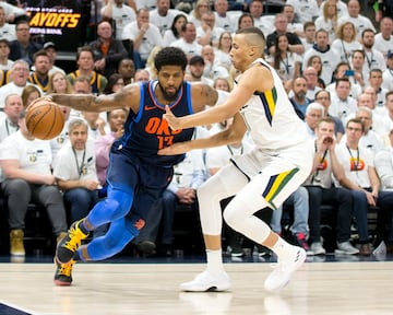 Paul George y Dante Exum.