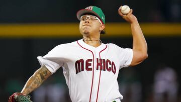 PHOENIX, AZ - MARCH 11: Julio Urías #7 of Team Mexico pitches during Game 1 of Pool C between Team Colombia and Team Mexico at Chase Field on Saturday, March 11, 2023 in Phoenix, Arizona. (Photo by Daniel Shirey/WBCI/MLB Photos via Getty Images)