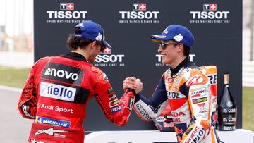 MotoGP - Portuguese Grand Prix - Algarve International Circuit, Portimao, Portugal - March 25, 2023 Ducati Lenovo Team's Francesco Bagnaia shakes hands with third placed Repsol Honda Team's Marc Marquez after winning the sprint race REUTERS/Marcelo Del Pozo