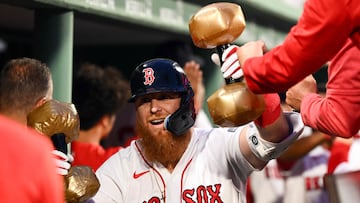 BOSTON, MASSACHUSETTS - JUNE 16: Justin Turner #2 of the Boston Red Sox celebrates with his teammates after hitting a grand slam against the New York Yankees during the third inning at Fenway Park on June 16, 2023 in Boston, Massachusetts.   Brian Fluharty/Getty Images/AFP (Photo by Brian Fluharty / GETTY IMAGES NORTH AMERICA / Getty Images via AFP)