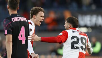 Feyenoord's Mats Wieffer (L) and Santiago Gimenez celebrate scoring the opening goal during the UEFA Europa League first leg quarter-final football match between Feyenoord Rotterdam and AS Roma at Feyenoord Stadion in Rotterdam on April 13, 2023. (Photo by Pieter Stam de Jonge / ANP / AFP) / Netherlands OUT