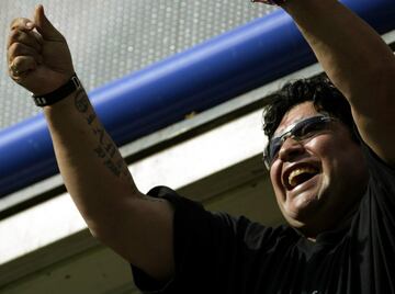 Diego Armando Maradona supporting Boca Juniors at La Bombonera.