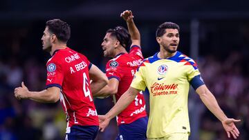       Ricardo Marin celebrates his goal 0-2 with Antonio Briseno of Guadalajara  and Henry Martin of America during the round of 16 second leg match between America and Guadalajara - Round of 16as part of the CONCACAF Champions Cup 2024, at Azteca Stadium on March 13, 2024 in Mexico City, Mexico.