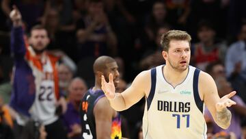 PHOENIX, ARIZONA - MAY 10: Luka Doncic #77 of the Dallas Mavericks reacts to a turnover during the second half of Game Five of the Western Conference Second Round NBA Playoffs at Footprint Center on May 10, 2022 in Phoenix, Arizona. The Suns defeated the Mavericks 110-80. NOTE TO USER: User expressly acknowledges and agrees that, by downloading and or using this photograph, User is consenting to the terms and conditions of the Getty Images License Agreement.   Christian Petersen/Getty Images/AFP
== FOR NEWSPAPERS, INTERNET, TELCOS & TELEVISION USE ONLY ==
