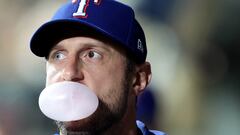 SEATTLE, WASHINGTON - SEPTEMBER 29: Max Scherzer of the Texas Rangers blows a bubble during the first inning Mariners at T-Mobile Park on September 29, 2023 in Seattle, Washington.   Steph Chambers/Getty Images/AFP (Photo by Steph Chambers / GETTY IMAGES NORTH AMERICA / Getty Images via AFP)