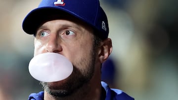 SEATTLE, WASHINGTON - SEPTEMBER 29: Max Scherzer of the Texas Rangers blows a bubble during the first inning Mariners at T-Mobile Park on September 29, 2023 in Seattle, Washington.   Steph Chambers/Getty Images/AFP (Photo by Steph Chambers / GETTY IMAGES NORTH AMERICA / Getty Images via AFP)