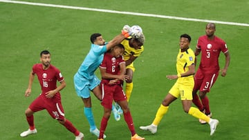 AL KHOR, QATAR - NOVEMBER 20: Saad Alsheeb of Qatar and Felix Torres Ecuador battle for the ball during the FIFA World Cup Qatar 2022 Group A match between Qatar and Ecuador at Al Bayt Stadium on November 20, 2022 in Al Khor, Qatar. (Photo by Hector Vivas - FIFA/FIFA via Getty Images)