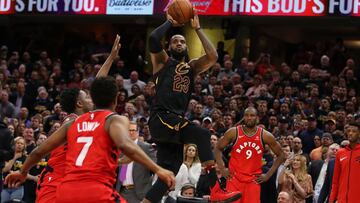 CLEVELAND, OH - MAY 05: LeBron James #23 of the Cleveland Cavaliers hits the game winning shot over the outstretched hand of OG Anunoby #3 of the Toronto Raptors to win Game Three of the Eastern Conference Semifinals 105-103 during the 2018 NBA Playoffs a