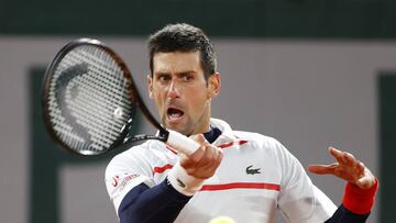 PARIS, FRANCE - OCTOBER 07: Novak Djokovic of Serbia plays a forehand during his Men&#039;s Singles quarterfinals match against Pablo Carreno Busta of Spain on day eleven of the 2020 French Open at Roland Garros on October 07, 2020 in Paris, France. (Photo by Clive Brunskill/Getty Images)