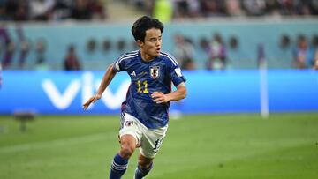 DOHA, QATAR - NOVEMBER 23: Takefusa Kubo of Japan in action during the FIFA World Cup Qatar 2022 Group E match between Germany and Japan at Khalifa International Stadium on November 23, 2022 in Doha, Qatar. (Photo by Stuart Franklin/Getty Images)