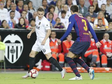 Kevin Gameiro y Gerard Piqué.