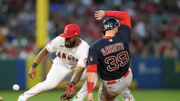 Jun 6, 2022; Anaheim, California, USA; Boston Red Sox right fielder Christian Arroyo (39) slides into second base to beat a throw to Los Angeles Angels second baseman Luis Rengifo (2) for a stolen base in the fifth inning at Angel Stadium.