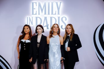 Ashley Park, Lily Collins, Philippine Leroy-Beaulieu and Camille Razat pose during a photocall for the launch of the Season 4 of Netflix Series "Emily in Paris"