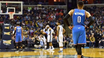 MEMPHIS, TN - APRIL 05: Russell Westbrook #0 of the Oklahoma City Thunder watches teammate Andre Roberson #21 line up to take a free throw against the Memphis Grizzlies during the first half at FedExForum on April 5, 2017 in Memphis, Tennessee. NOTE TO USER: User expressly acknowledges and agrees that, by downloading and or using this photograph, User is consenting to the terms and conditions of the Getty Images License Agreement. Frederick Breedon/Getty Images/AFP
== FOR NEWSPAPERS, INTERNET, TELCOS & TELEVISION USE ONLY ==