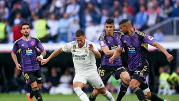 MADRID, SPAIN - APRIL 02: Eden Hazard of Real Madrid CF competes for the ball with Joaquin Fernandez of Real Valladolid CF during the LaLiga Santander match between Real Madrid CF and Real Valladolid CF at Estadio Santiago Bernabeu on April 02, 2023 in Madrid, Spain. (Photo by Mateo Villalba/Quality Sport Images/Getty Images)