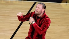 MIAMI, FLORIDA - JUNE 09: Conor McGregor is seen on the court during a timeout in Game Four of the 2023 NBA Finals between the Denver Nuggets and the Miami Heat at Kaseya Center on June 09, 2023 in Miami, Florida. NOTE TO USER: User expressly acknowledges and agrees that, by downloading and or using this photograph, User is consenting to the terms and conditions of the Getty Images License Agreement.   Megan Briggs/Getty Images/AFP (Photo by Megan Briggs / GETTY IMAGES NORTH AMERICA / Getty Images via AFP)