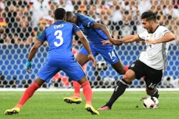 Germany's Emre Can (right) contests possession with France's Blaise Matuidi (centre) and Patrice Evra.