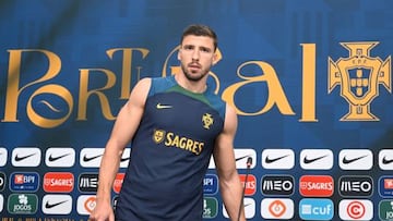 Portugal's defender Ruben Dias gives a press conference at the Al Shahaniya SC training site in Al Samriya, northwest of Doha, on November 22, 2022, during the Qatar 2022 World Cup football tournament. (Photo by PATRICIA DE MELO MOREIRA / AFP) (Photo by PATRICIA DE MELO MOREIRA/AFP via Getty Images)