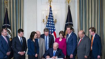 US President Joe Biden signs S. 3580, the Ocean Shipping Reform Act of 2022, in the State Dining Room of the White House in Washington, D.C., US, on Thursday, June 16, 2022. Biden signed the bipartisan bill aimed at driving down costs of shipping goods overseas, a measure his administration has touted as a weapon in its fight against historic inflation.