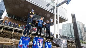 (L-R) Carlos Gimeno of Spain, Constantin Popovici of Romania and Aidan Heslop of the UK celebrate on the podium during the final competition day of the first stop of the Red Bull Cliff Diving World Series in Boston, USA on June 3, 2023. // Romina Amato / Red Bull Content Pool // SI202306030629 // Usage for editorial use only //