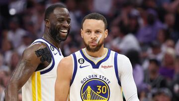 SACRAMENTO, CALIFORNIA - APRIL 30: Stephen Curry #30 of the Golden State Warriors and Draymond Green #23 react during the fourth quarter in game seven of the Western Conference First Round Playoffs against the Sacramento Kings at Golden 1 Center on April 30, 2023 in Sacramento, California. NOTE TO USER: User expressly acknowledges and agrees that, by downloading and or using this photograph, User is consenting to the terms and conditions of the Getty Images License Agreement. Ezra Shaw/Getty Images/AFP (Photo by EZRA SHAW / GETTY IMAGES NORTH AMERICA / Getty Images via AFP)