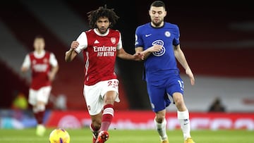 26 December 2020, England, London: Arsenal&#039;s Mohamed Elneny (L) and Chelsea&#039;s Mateo Kovacic battle for the ball during the English Premier League soccer match between Arsenal and Chelsea at the Emirates Stadium. Photo: Andrew Boyers/PA Wire/dpa
