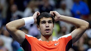 Spain's Carlos Alcaraz celebrates after winning against USA's Frances Tiafoe during their 2022 US Open Tennis tournament men's singles semi-final match at the USTA Billie Jean King National Tennis Center in New York, on September 9, 2022. (Photo by KENA BETANCUR / AFP)