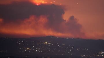 A view shows smoke on the Lebanese side of the border with Israel, after Israel said it had noted armed group Hezbollah preparing to attack Israel and had carried out pre-emptive strikes on Hezbollah targets in Lebanon, as seen from Tyre, southern Lebanon August 25, 2024. REUTERS/Aziz Taher