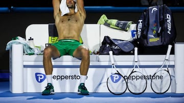 TURIN, ITALY - NOVEMBER 18: Novak Djokovic of Serbia takes a break during his Round Robin Singles match against Daniil Medvedev during day six of the Nitto ATP Finals at Pala Alpitour on November 18, 2022 in Turin, Italy. (Photo by Shi Tang/Getty Images)