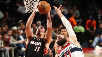 Basketball - NBA - Miami Heat v Washington Wizards - Arena CDMX, Mexico City, Mexico - November 2, 2024 Miami Heat's Jaime Jaquez Jr. in action with Washington Wizards' Jonas Valanciunas REUTERS/Henry Romero