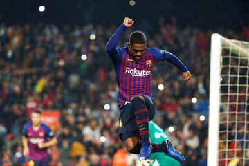 High | Barcelona's Malcom Filipe Silva celebrates his goal.