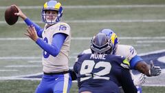 SEATTLE, WASHINGTON - JANUARY 09: Quarterback Jared Goff #16 of the Los Angeles Rams drops back to pass against the defense of the Seattle Seahawks during the the NFC Wild Card Playoff game at Lumen Field on January 09, 2021 in Seattle, Washington.   Step