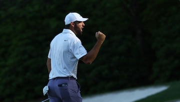 Golf - The Masters - Augusta National Golf Club, Augusta, Georgia, U.S. - April 13, 2024  Scottie Scheffler of the U.S. celebrates after holing his eagle putt on the green on the 13th hole during the third round REUTERS/Eloisa Lopez